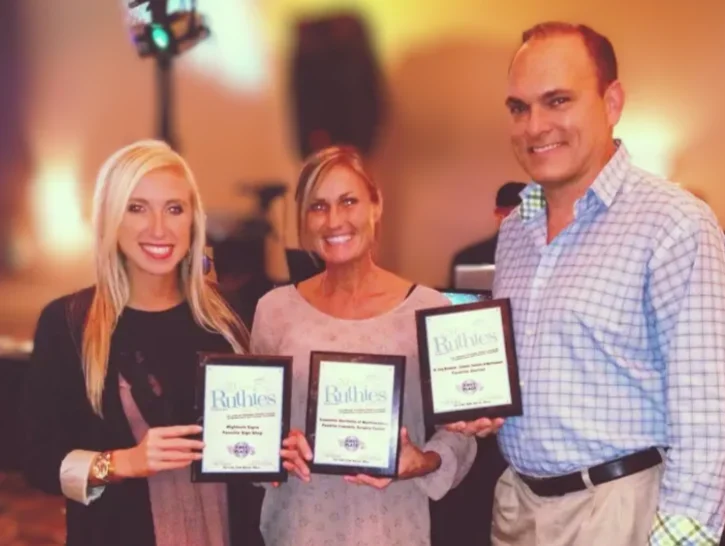 Greg Nicholson, DDS and dental office staff holding Ruthies Awards in Murfreesboro, Tennessee