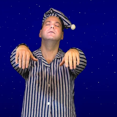 Humorous image of a man sleepwalking in pajamas and a nightcap